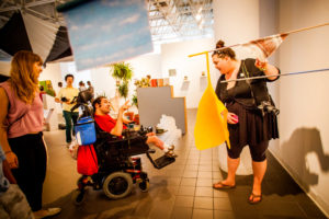 A group of people attend a tour of Moore College of Art & Design.