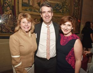 John Posing with Julie Natale, partner at PricewaterhouseCoopers L.L.P., John Orr, Art Reach and Beth Fulton