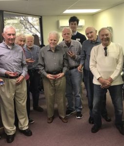 Older Gentlemen from Alzheimers Association posing together at their Bollywood dance lession