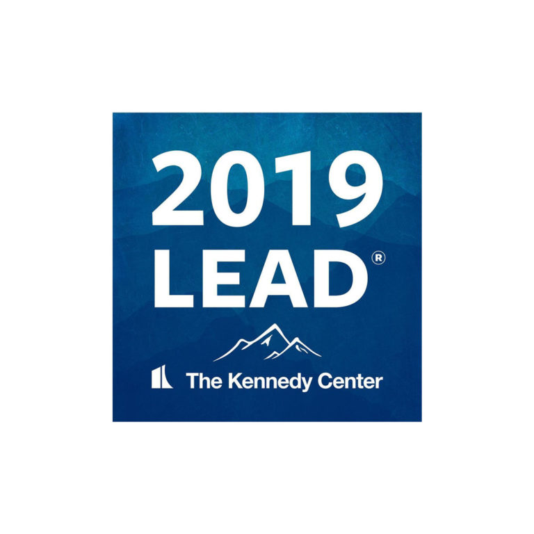 Navy Blue LEAD logo reads: 2019 LEAD, The Kennedy Center with white capped mountains illustrated above "the Kennedy Center