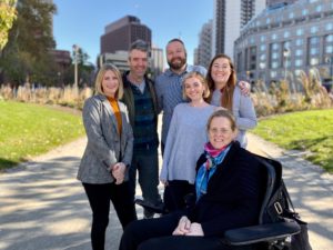Staff Photo outside from left: Deputy Director Lauren Garnese, Executive Director, John Orr, Director of ACCESS Philly, Charlie Miller, Member Services Coordinator Alex Boyle, Director of Programs, Katie Samson, Assitant Director of Communications Kelly McCaughern