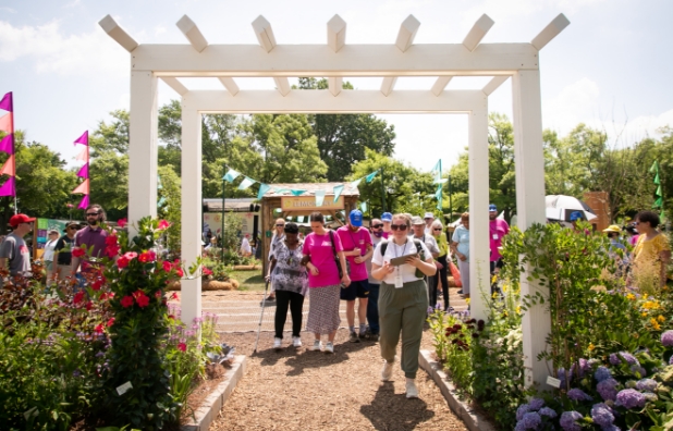 an audio-described tour at an outdoor Philadelphia garden show